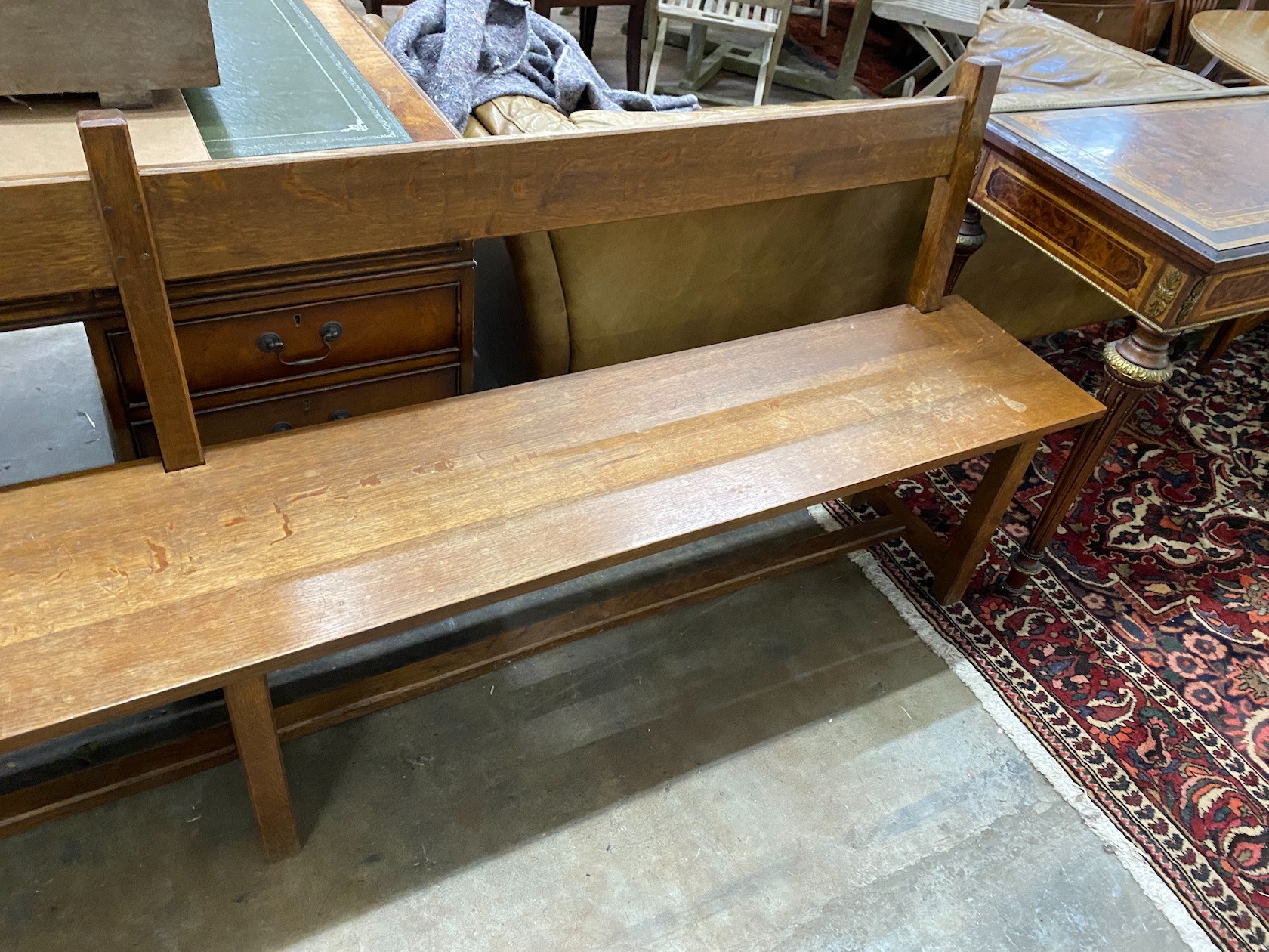 An early 20th century French oak chair back bench, length 250cm, depth 36cm, height 85cm